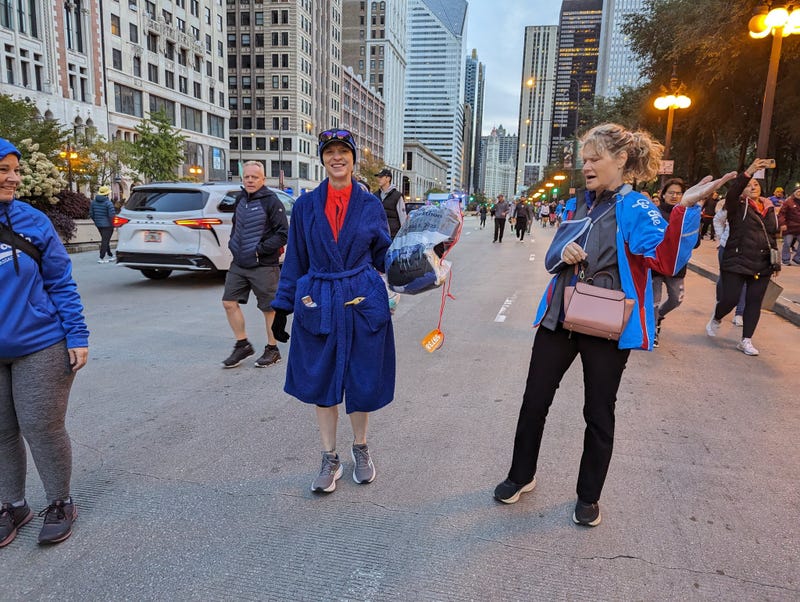 Many Chicago Marathon runners showed up to the race in bathrobes, which were easy — and perhaps more importantly, warm — layer to shed. Temperatures were in the 40s before the race kicked off.
