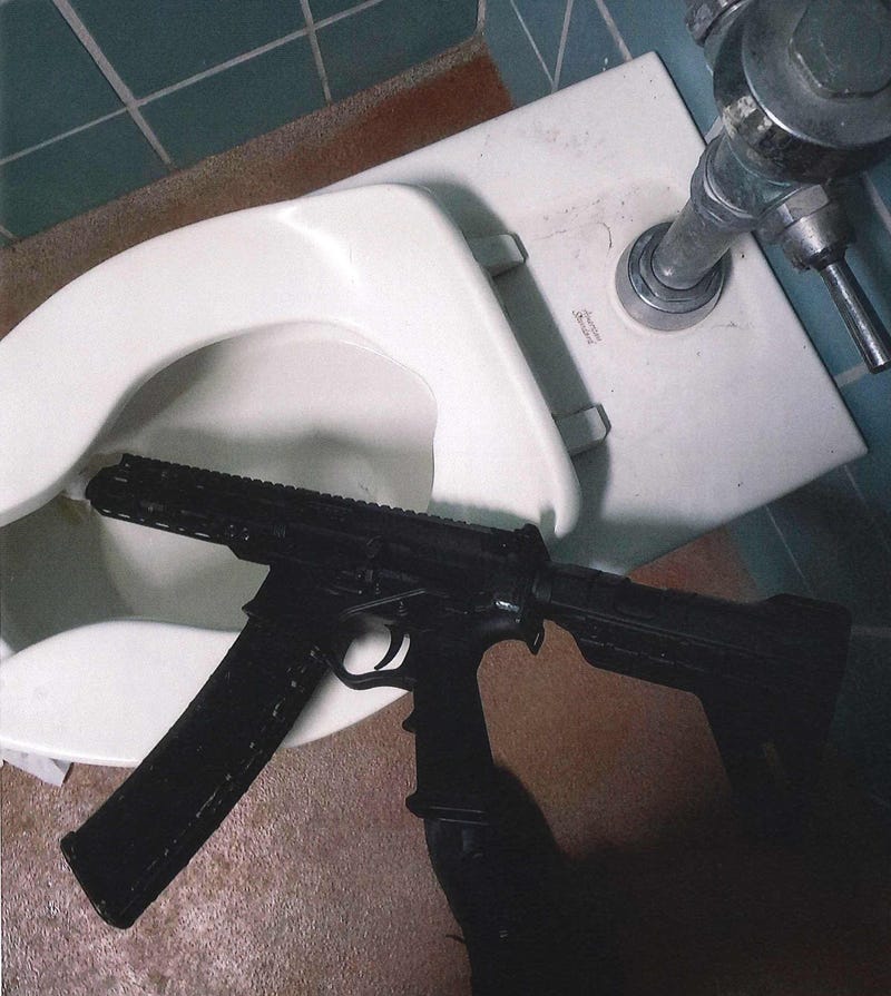 A gang member and an accomplice allegedly attempted to hide their weapons in a Kezar Stadium bathroom.