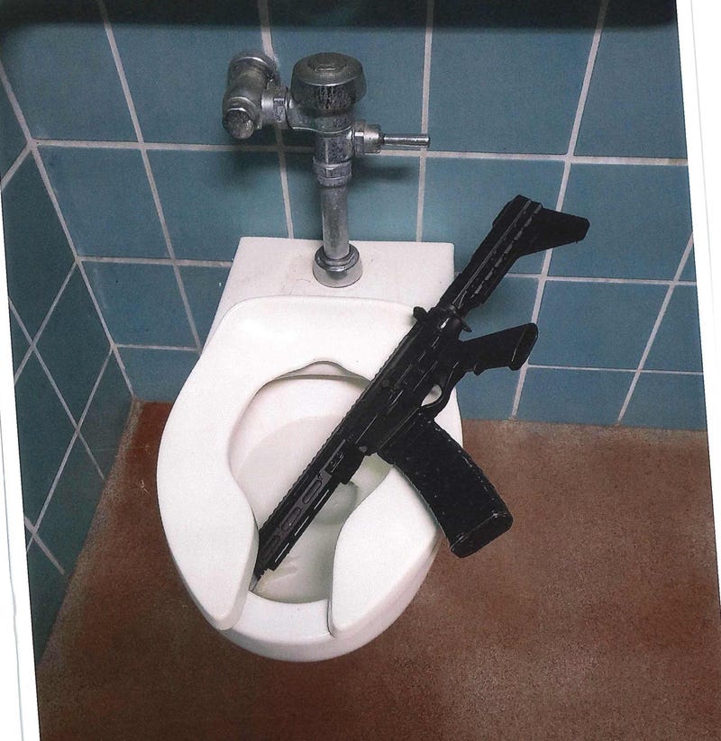 A gang member and an accomplice allegedly attempted to hide their weapons in a Kezar Stadium bathroom.