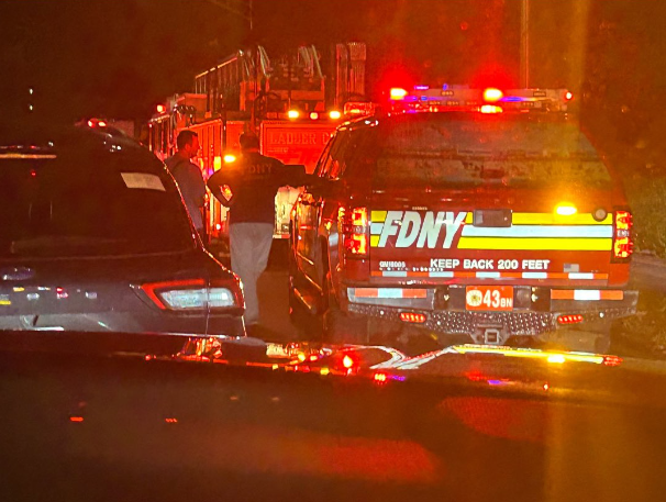Deputy Chief George Healy rescued a man from a burning car early Monday morning; pictured above is him at the scene of the accident.