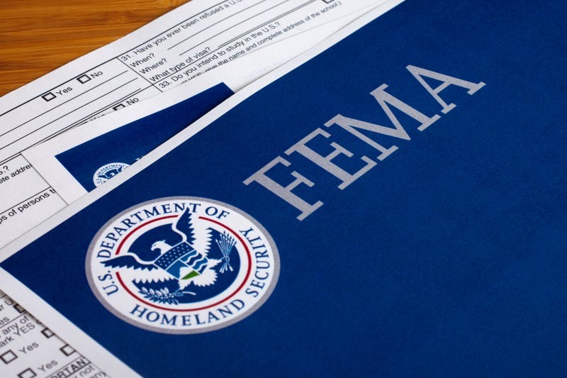 FEMA folder with papers