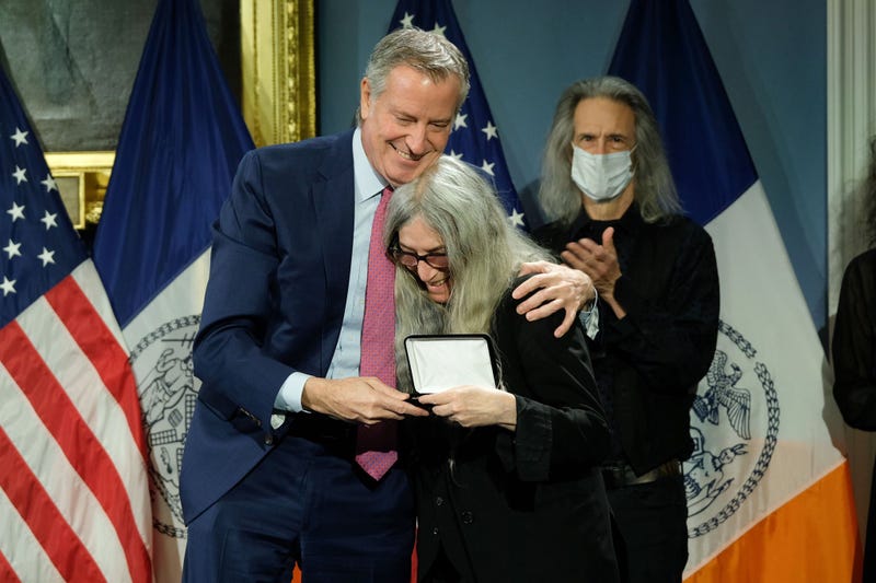 Mayor de Blasio presents Patti Smith with the key to the city on Monday