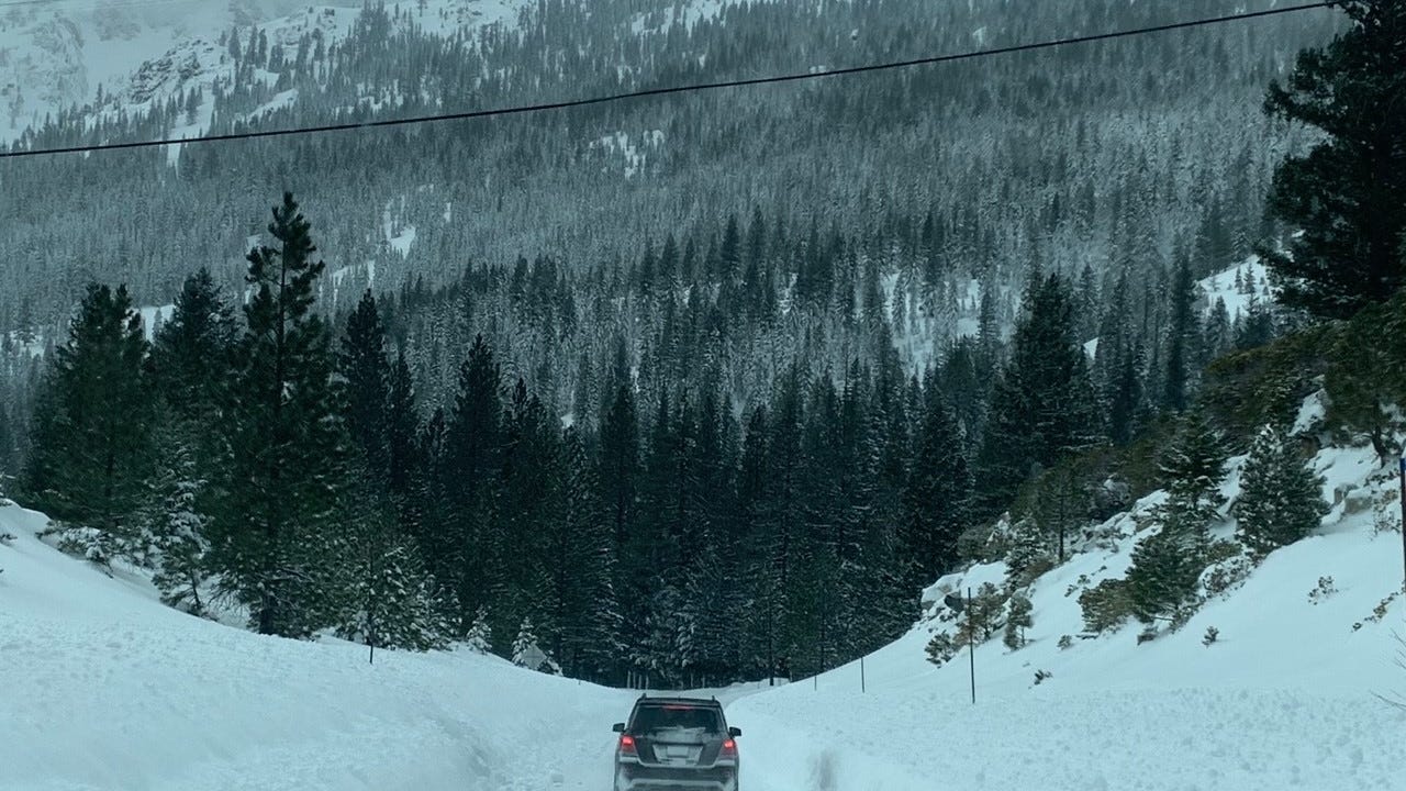 PHOTOS: Tahoe traffic clogged by historic snowstorm, roadways open to 'essential' travel