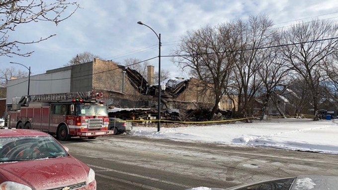 Building with snowy roof collapses in Englewood