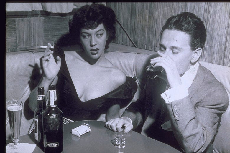 retro photo of couple drinking at a bar