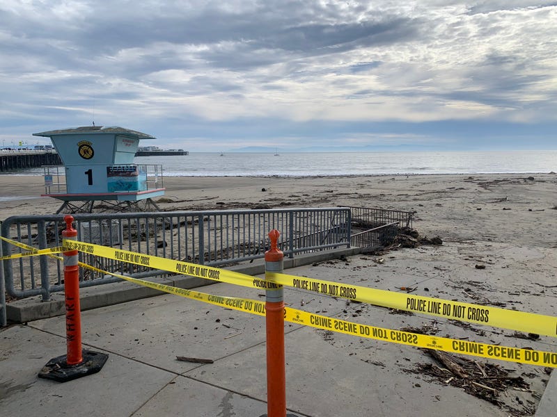 The Santa Cruz beach has been closed as tsunami debris covers the sand.