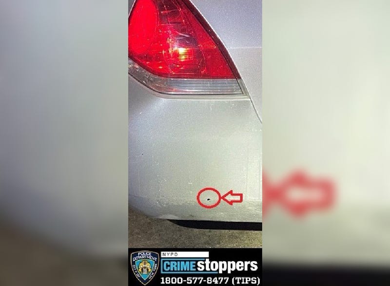 One bullet fired by a suspect struck the rear bumper of an unmarked vehicle, police said