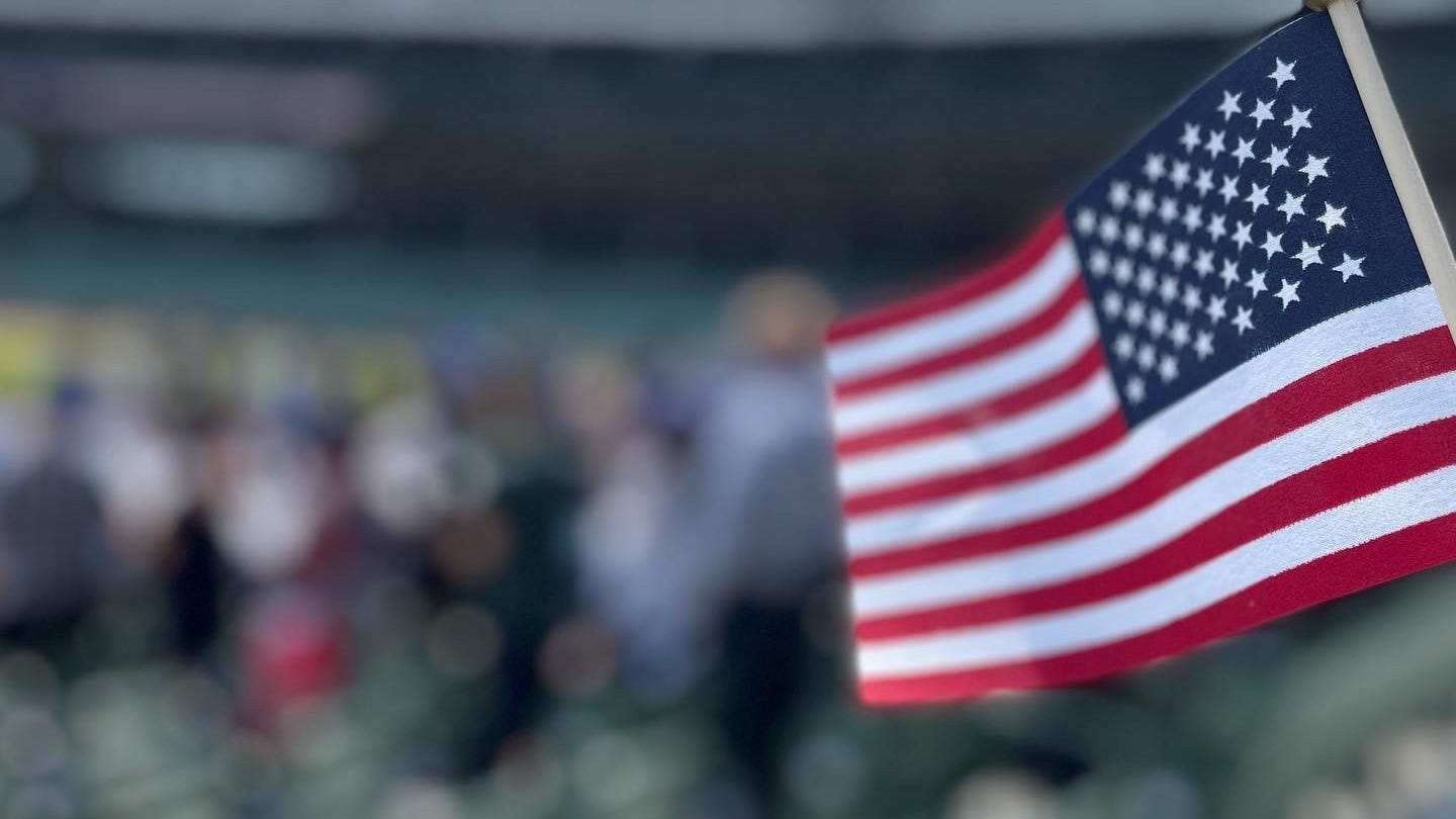 Wrigley becomes field of dreams for new U.S. citizens