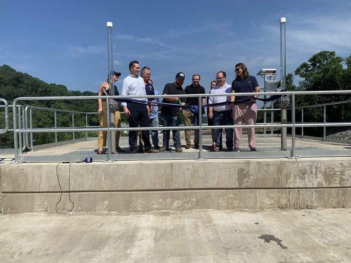 Officials cut the ribbon on the new gate at Flat Rock, reconnecting the Manayunk Canal to the Schuylkill River.