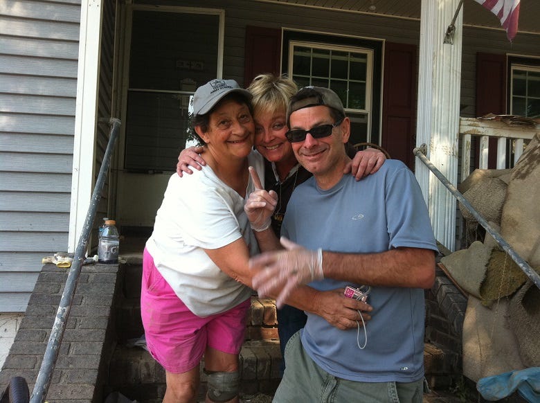 Rocky & Sue with flood victim