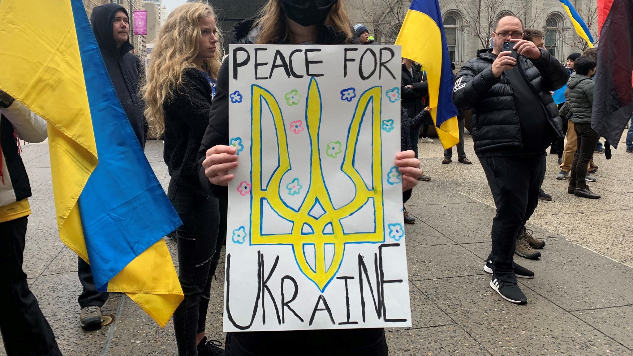 ‘Innocent people die’: Protesters at City Hall demand end to Russia invasion of Ukraine