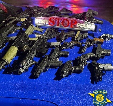 Table full of guns