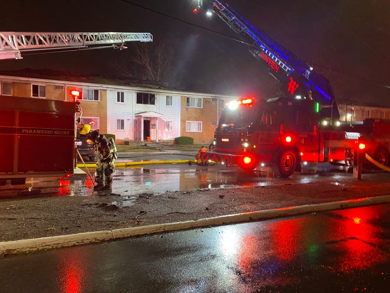 Scene of apartment fire and Warren firefighters