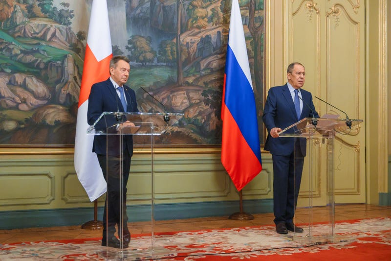 Russian Foreign Minister Sergey Lavrov (right) said the West has declared "total war" on Russia