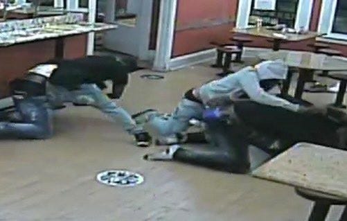 An image of the fight and struggle over a handgun that occurred inside the La Victoria Restaurant.