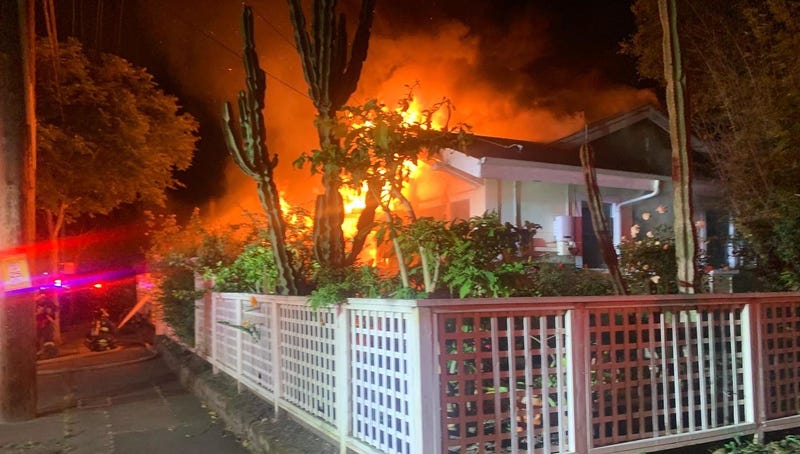 A fire burns early Monday morning on the 700 block of Buena Vista Avenue in Alameda.