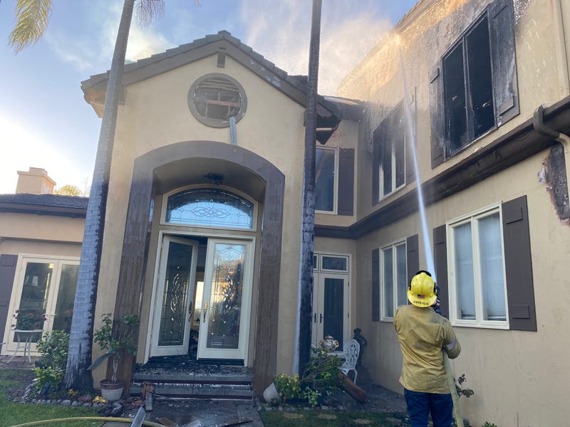 Dozens of multi-million dollar homes have been destroyed after a wildfire ripped through an upscale community in Orange County Wednesday.