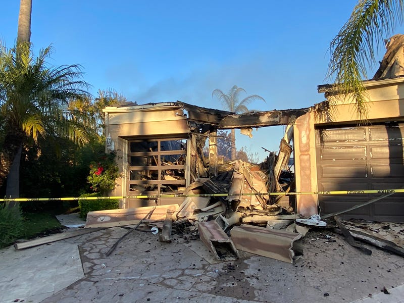 Dozens of multi-million dollar homes have been destroyed after a wildfire ripped through an upscale community in Orange County Wednesday.