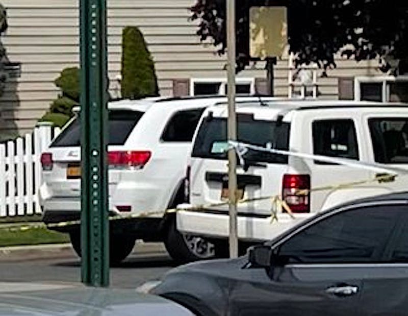 A white Jeep and police tape could be seen at the intersection on Thursday morning