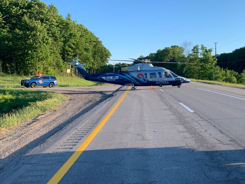 State police said alcohol was a factor in a serious road crash after an alleged impaired driver crossed over into the emergency lane and slammed into the back of a disabled vehicle in Lower Northern Michigan on Thursday evening.