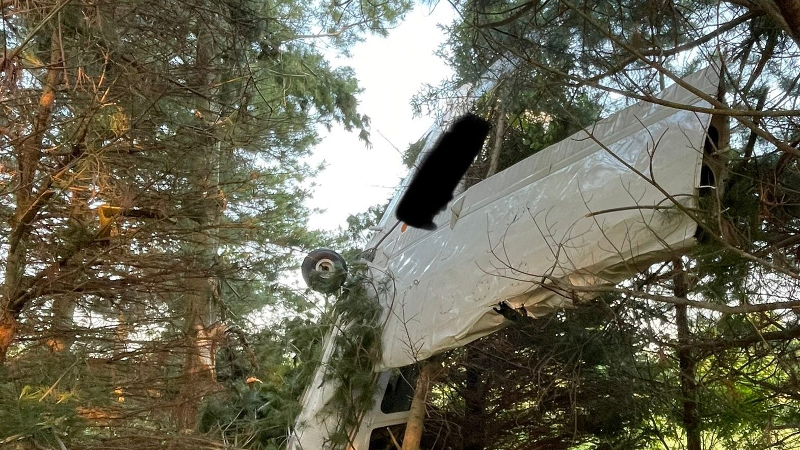Single engine plane crashes into woods during take off in Mid-Michigan