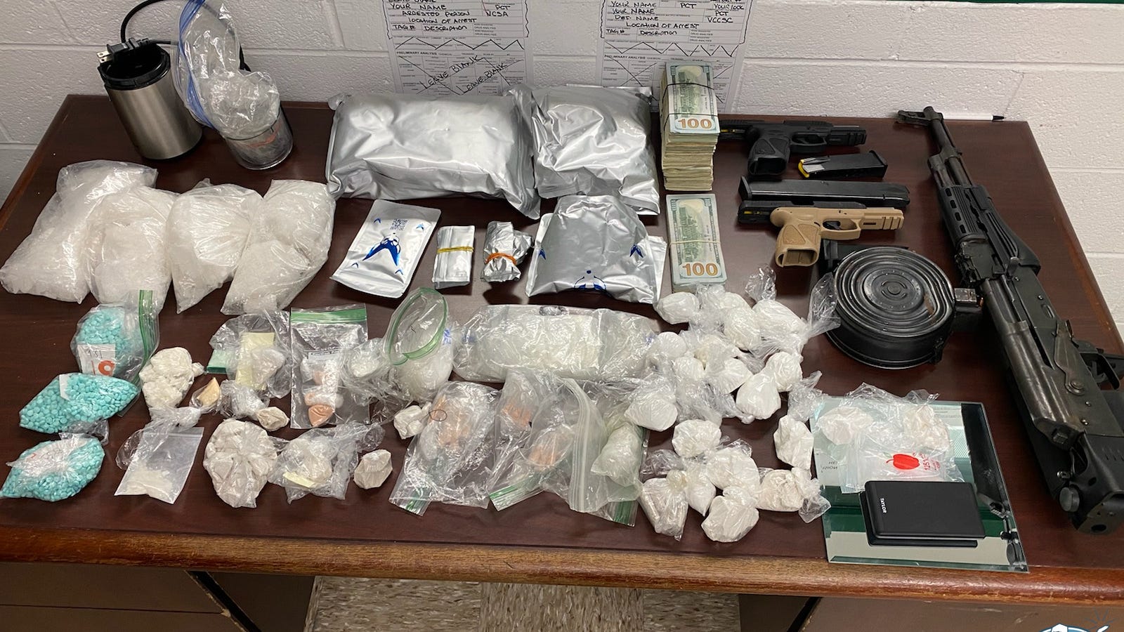 Cops discover large cache of drugs, weapons while arresting shooting suspect in Detroit