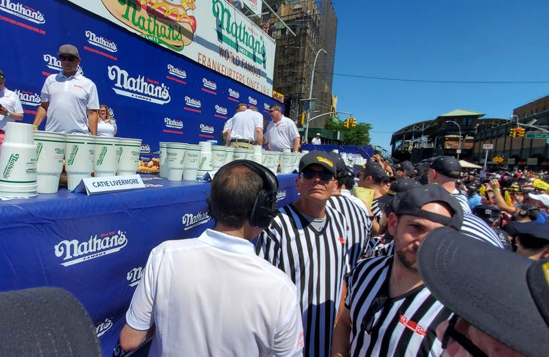 Thousands of people turned out in Coney Island on a hot, sunny Monday for the annual competition