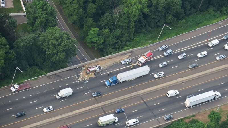 The truck overturned in the northbound lanes of the Connecticut Turnpike in Old Greenwich