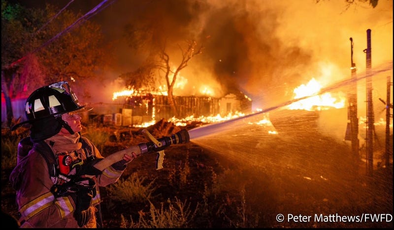 Fire crews fight a blaze in Fort Worth, Texas.