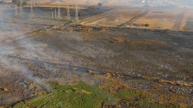 Air quality advisory extended from Marsh Fire smoke, crews struggle to smother blaze