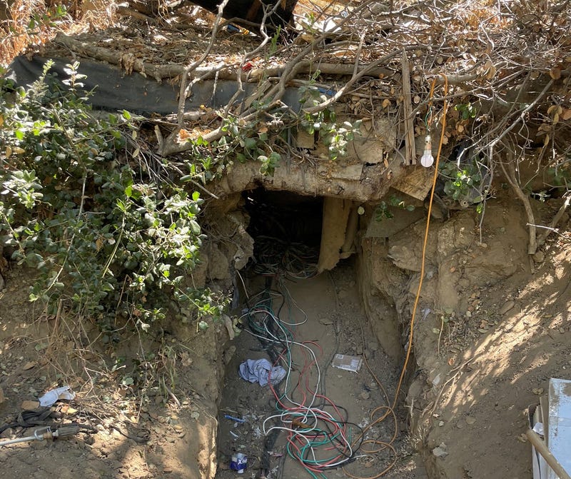 Police have arrested six suspects after finding a bunker full of stolen goods at a homeless encampment in San Jose.