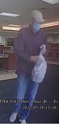 Police in Ann Arbor are searching for a male suspect wanted in connection to a robbery at the Fifth Third Bank on Washtenaw Ave. Friday afternoon.