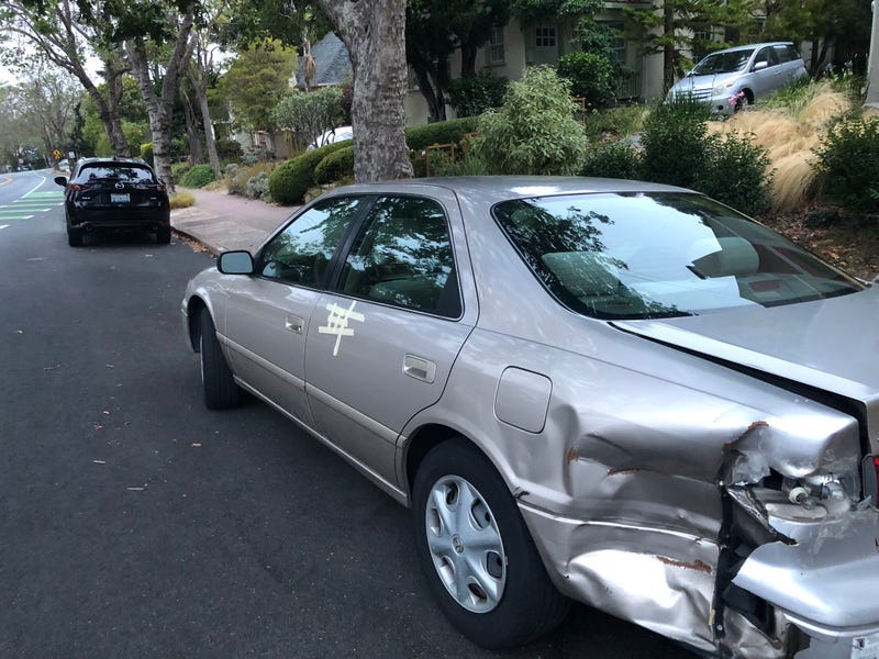 Tuesday morning, the swastikas had mostly been covered over by tape or cardboard. 