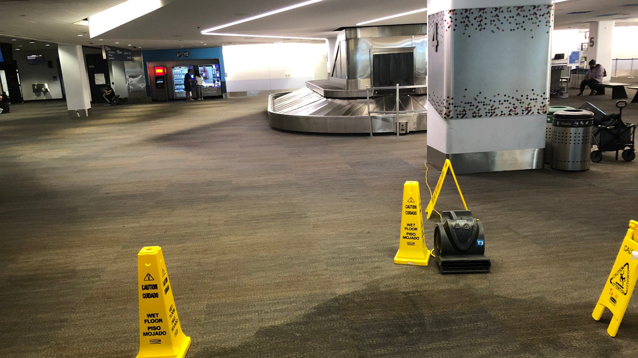 SFO employee stabbed at baggage claim, man arrested