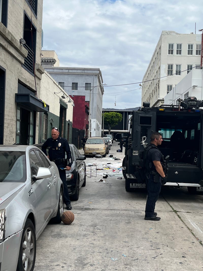 Police arrest man who witnesses say shot at cars and buildings in Hollywood as vendors were setting up for farmers market on Cosmo St.