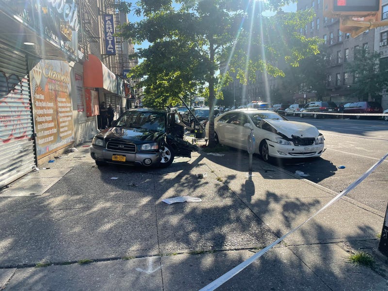 At least one of the vehicles landed on a sidewalk during the horrific early morning crash