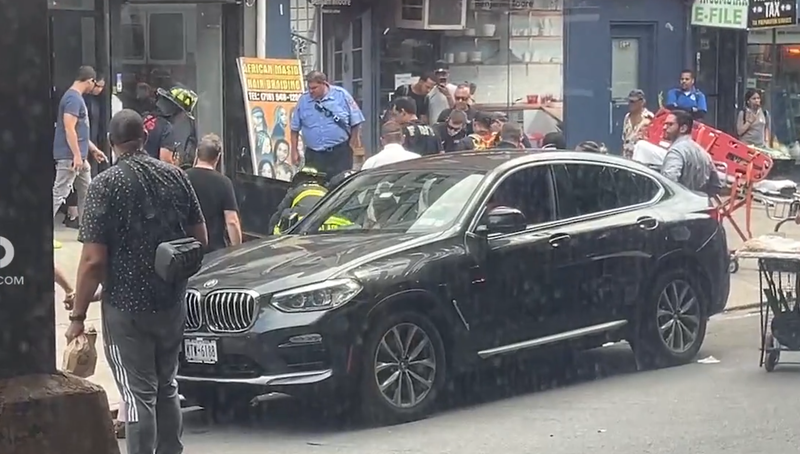 Citizen App footage shows an injured person near cellar doors on Broadway and West 232nd Street in the Bronx being aided by EMS and fire officials.
