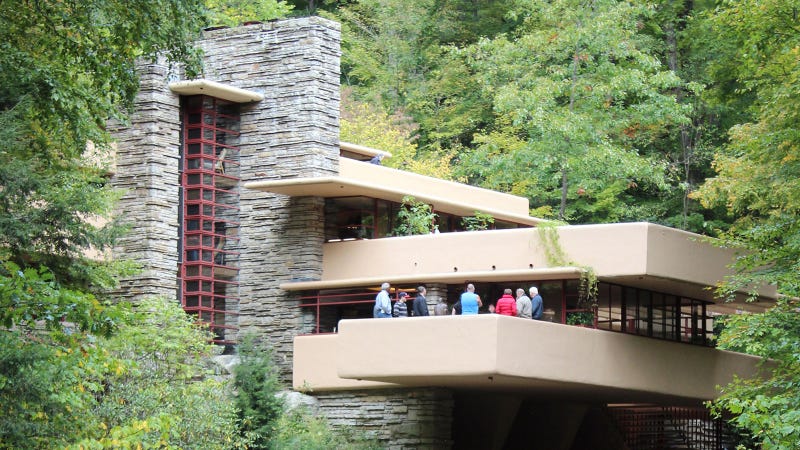 Tourists appear on the terrace at Frank Lloyd Wright's Fallingwater
