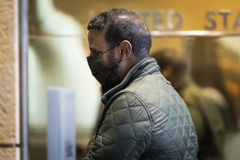 Defendant Abdiaziz Shafii Farah walks into United States District Court during the third day of jury selection in the first Feeding Our Future case to go to trial in Minneapolis, April 24, 2024. 