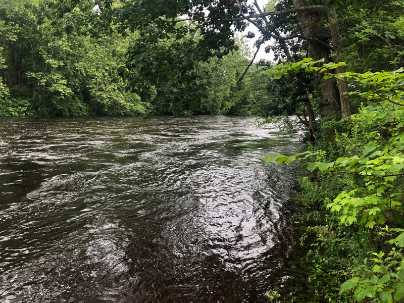 The Farmington River in Unionville, near the site where the bodies of two teenagers were recovered, 7/19/21.