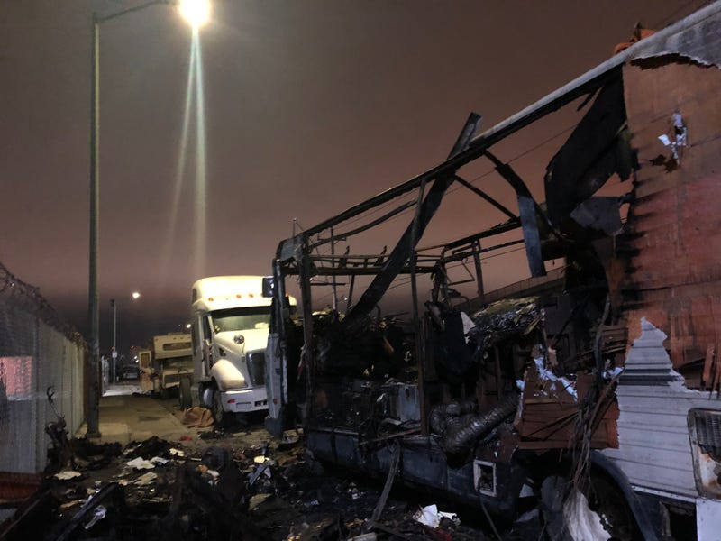 An RV on Wood Street has been completely gutted by fire. The owner’s belongings are charred and scattered across the street, making up just one of the recent vehicle fires.