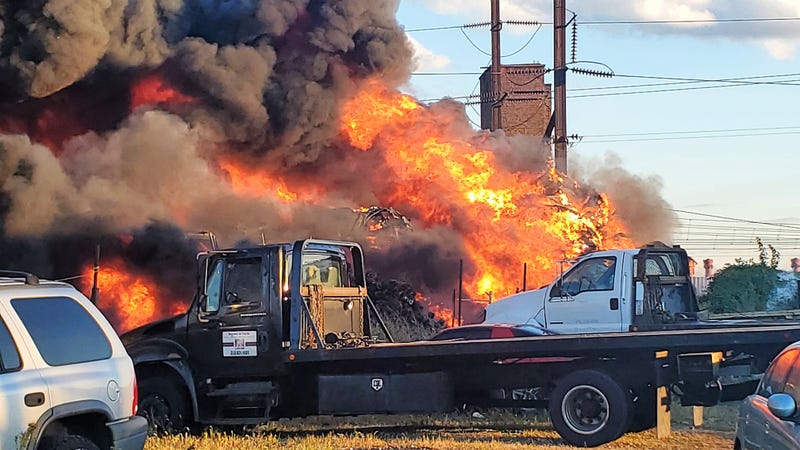 A three-alarm fire at a junkyard in North Philadelphia.