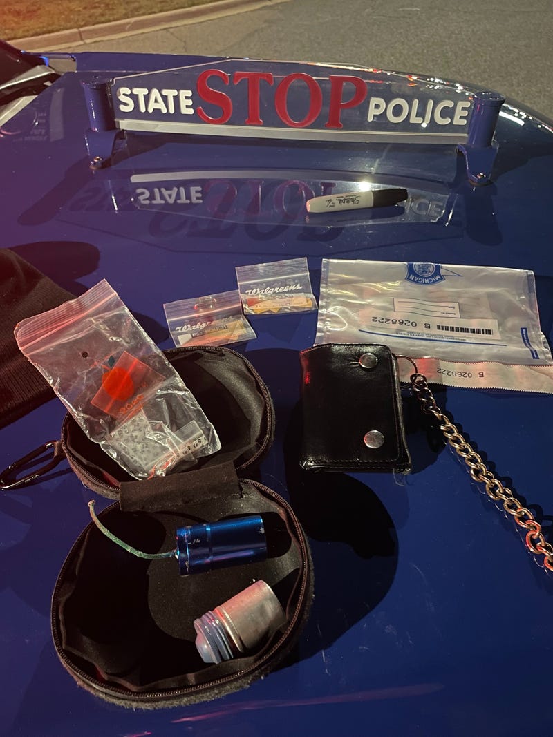 A hunch by troopers in Northern Michigan proved right after they conducted a traffic stop on a suspected drug deal and found not only drugs, but firearms and a homemade bomb, officials said.