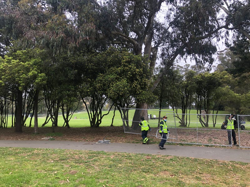 San Francisco Recreation and Parks Department staff assemble fencing at Golden Gate Park ahead of 420 Day to discourage large gatherings as the coronavirus crisis continues.
