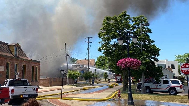Dumpster fire spreads to car, which explodes, igniting businesses in downtown Fenton
