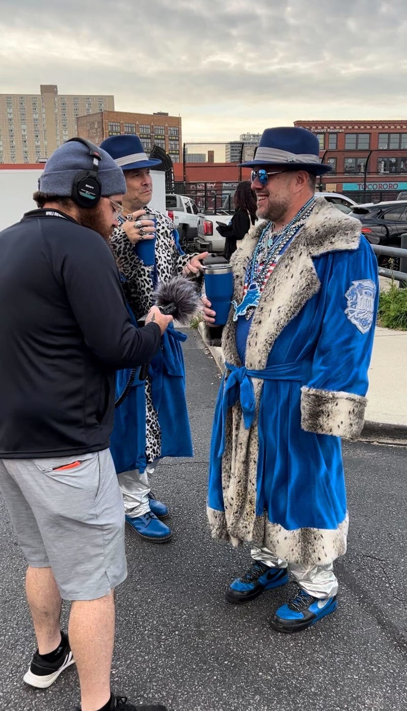 WWJ's Zach Clark talks to Lions fans in Eastern Market