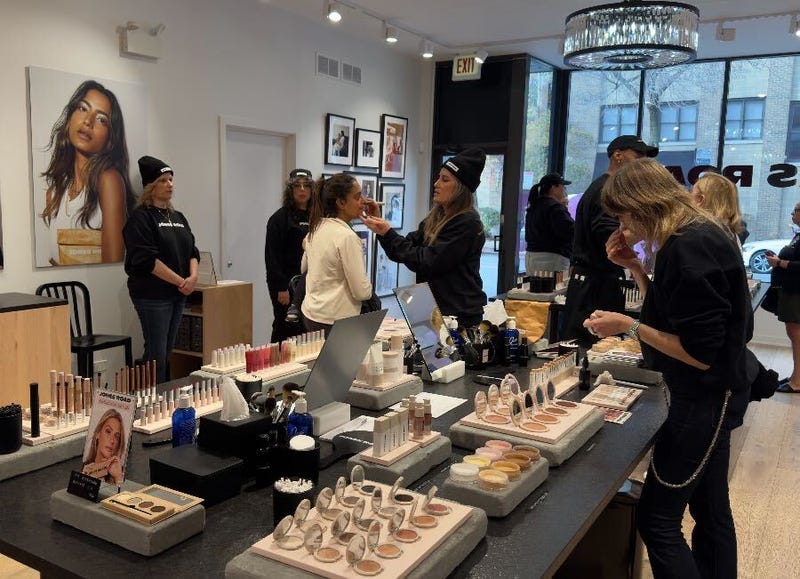 Shoppers sample some of the products offered inside Bucktown's Jones Road shop.