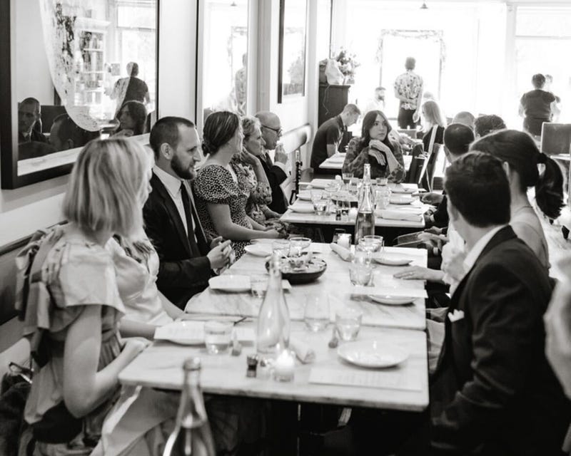 Seated guests inside of Lula Cafe.