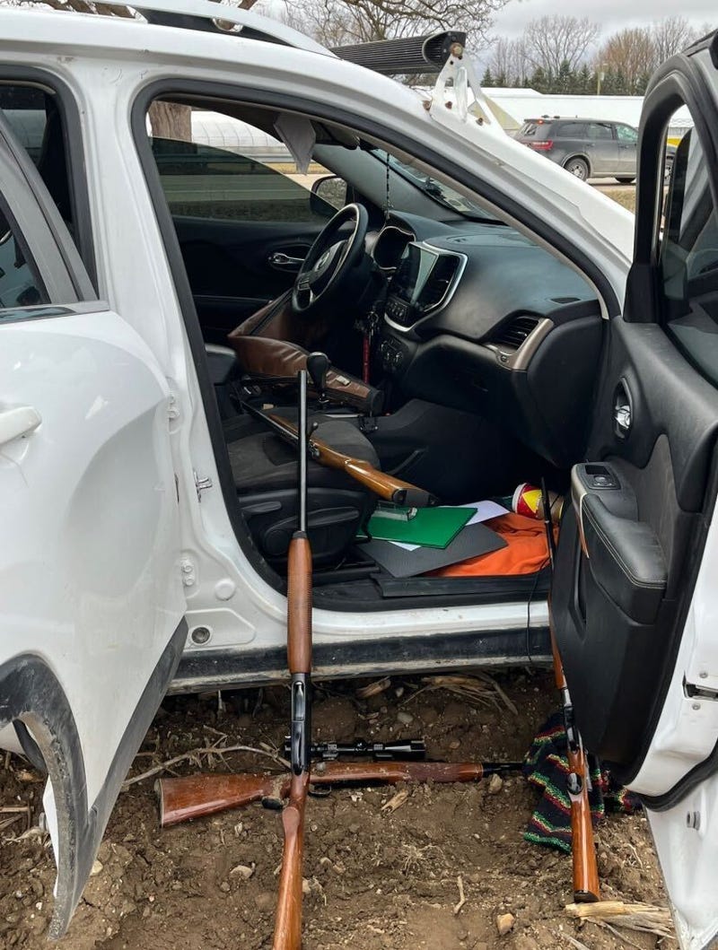 Photo of guns and vehicle