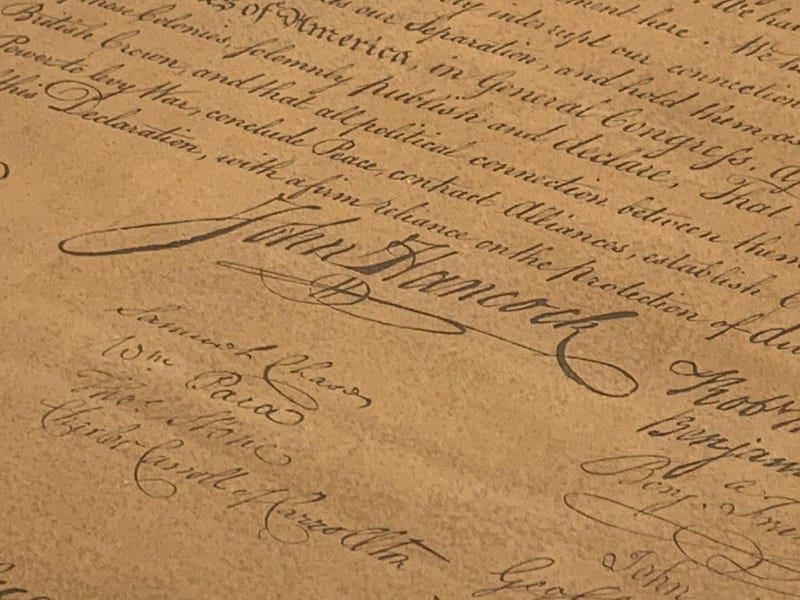 Signatures on an authentic copy of the Declaration of Independence.